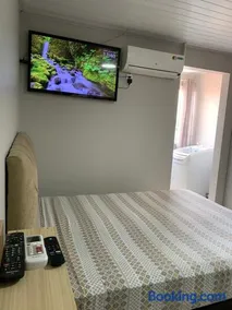 Lindo JK para 2 pessoas com garagem wifi e ar condicionado - Image 4