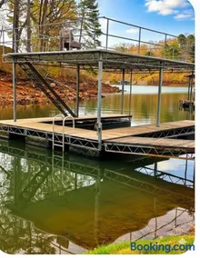 Lake Lanier 3BR Cozy Retreat with Screened Porch, Deck and Dock - Image 1