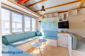 Welcome in - Slaapstrandhuisje I Strand dishoek 342, Direct aan zee met panoramisch uitzicht - Image 1