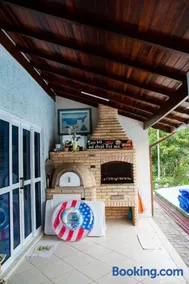 Casa com Piscina e Jacuzzi a 500m da Praia Guaratuba - Image 3