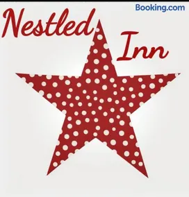 Nestled Inn Bed and Breakfast - Image 1