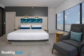 River Garden Hotel + Suites - Image 1