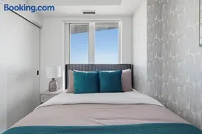 Modern 2BR Retreat with Private Balcony & Parking - Image 2