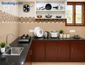 SLS Homestay - Luxury AC Service Apartments 1BHK, 2BHK, 3BHK - Direct Flyover to Alipiri Tirumala Gate - Walk to PS4 Pure Veg Restaurants, Supermarkets - Near to National Highway & Padmavathi Amma Temple - Modular Kitchen, Living room -Free Superfast Wifi - Image 5