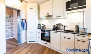 Charmant appartement adapté aux familles avec terrasse, jardin et sauna | Vue panoramique | Plage à proximité - Image 4