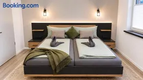 Urlaub an der Nordsee in barrierefreier Ferienwohnung Abendrot mit Wallbox und Leihfahrrädern - Image 2