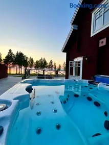 Lakeside Villa with Sauna & Hot Tub - Image 1