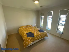 Elegant master bedroom with private bathroom - Image 5