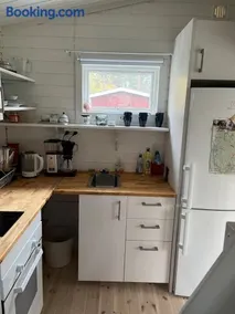 A simple stuga on a lake incinerating toilet in a separate building next to the cabin Water for drinking and washing hands dishes comes from two containers that attach to a faucet through a simple electric pump OBS no shower on site - Image 2