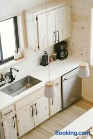 Riverside Retreat: Unwind in a Cabin with Private Steam Sauna on the Pine River - Image 2
