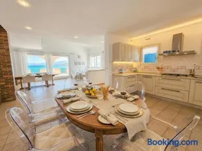 Villa Horizon with Jacuzzi and Infinite View over the Bay of Nymphs - Image 3