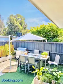Modern Family Oasis - 4BR, Free Parking, Steps to Shops & Train - Image 2