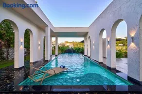 SaffronStays Elysian Retreat - 5BHK Luxury Villa in Alibaug with Pool, Jacuzzi, Lawn & Bonfire - Image 2
