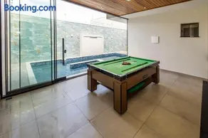 Casa Munique Maringa Com Piscina Ar Condicionado e Churrasqueira - Image 2