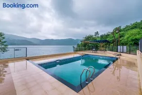 SaffronStays Riverdale - 4BR pool villa in Lavasa with gazebo, Indonesian artwork, and cricket pitch - Image 1