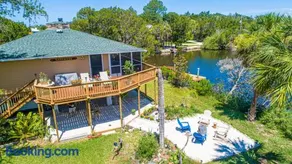 GULF BREEZE HIDEAWAY Waterfront access on the Salt River offers a Dock, Large outdoor firepit, Sleeps 4 in 2 King bedrooms each with a pvt bathroom, 1 Dog Ok with pet fee - Image 1