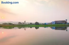 StayVista's Eva Villa - Lakeside Luxury with Modern Decor, Pool & Expansive Lawn - Near Sula - Image 2
