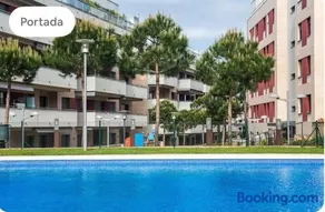 Precioso piso cerca de playa Fenals con 2 piscinas y terraza - Image 1
