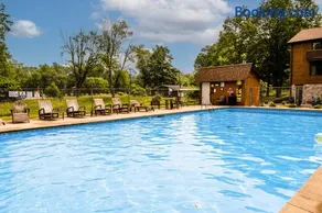 4BR Spacious Condo, Private Lake MI Beach Access, Outdoor Heated Pool - Image 1
