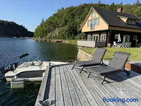 Log cabin with pool, sauna and boat by Torreby Castle - Image 1