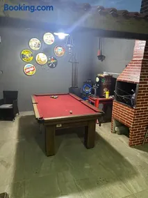 Casa com 3 dormitórios com jacuzzi para relaxar com a família! - Image 1