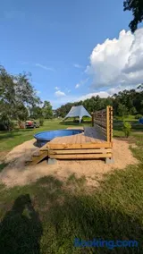Highland Cow Glamping in a Cozy King Bed Wagon - Image 3