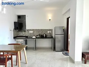 Boutique 1BHK Pool Retreat with Modern Amenities and Private Balcony - Image 4