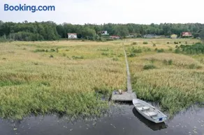 Sjötomt med privat brygga, roddbåt & solnedgång - Image 1