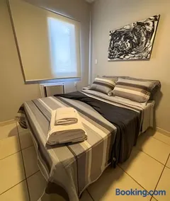 2 quartos, ar condicionado e pertinho do centro - Image 4