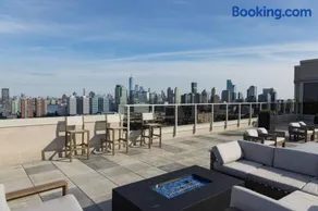Modern Loft 15 Min from NYC with City View & Pool - Image 3