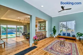 SaffronStays Six Oaks - 4BR Lakeside Villa with Pool, Games Room & Backwater Views - Image 2