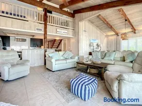 Beachfront Deck with steps down to the white sandy beach Sea Dunes Sandcastle 1A - Image 2