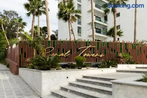 Seaview 2BR Apt Near Beach, AC, Pool, Balcony - Image 3