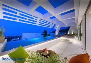 Villa Aqua 208 Stunning Sunset Ocean View Villa with Infinity Pool & Shared Gym - Image 3
