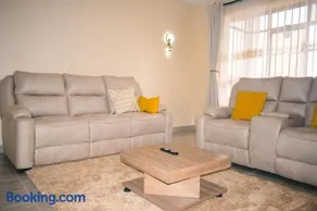 Gold and Elegant Ravic Homes Shawmut Suites with a Pool and Gym - Image 1