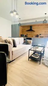 Modern Apartment with Fireplace & Stylish Kitchen - Image 2
