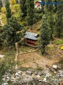 Zevibes Riverside Wood and Stone Villa - Image 1