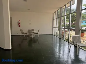 Cobertura Duplex frente Praia Massaguaçu 6 pessoas com vista e piscina - Image 4