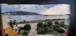 Panoramic View of Ornos Bay in Mykonos & Pool by ΜΡS - Image 2