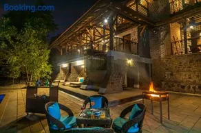 SaffronStays Vedika - 4BR riverfront pool villa with kaya king bullock ride & BBQ near Pinjal River, Vikramgad - Image 3