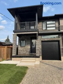 Stylish New Home Near Downtown & Highway - Image 1