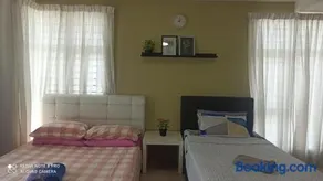 Zulanie Family Studio at D'Perdana Apartment, Spacious and Cozy with POOL, Free Wifi & Netflix - Image 1