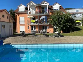 Die Seeblume - Ferienwohnung mit Pool und Seeblick - Image 2