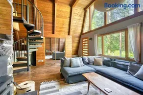 Modern A-Frame Cabin in the Woods - Image 1