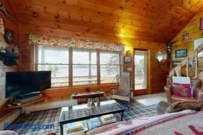 Cozy, dog-friendly waterfront cabin with large yard, porch, dock, & lake views - Image 4