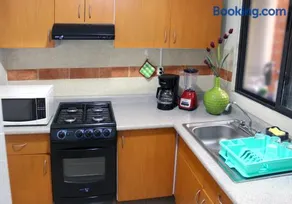 Casa Palmera en Condominio con seguridad Aire acondicionado Alberca Wifi cocina y TV - Image 3