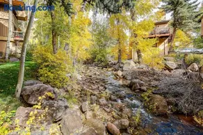 Peaceful creek view from the deck! Walk to Shuttle - Image 3