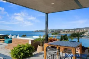 Cozy Modern Condo with Scenic Balcony Views - Image 1