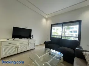 Appartement Luxe Vue Piscine Résidence Les Perles de Bentriaa, El Mansouria - Image 4