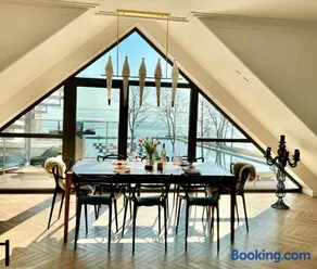 Apartament Masuria Sky w Nautica Resort z widokiem na jezioro Niegocin - Image 1